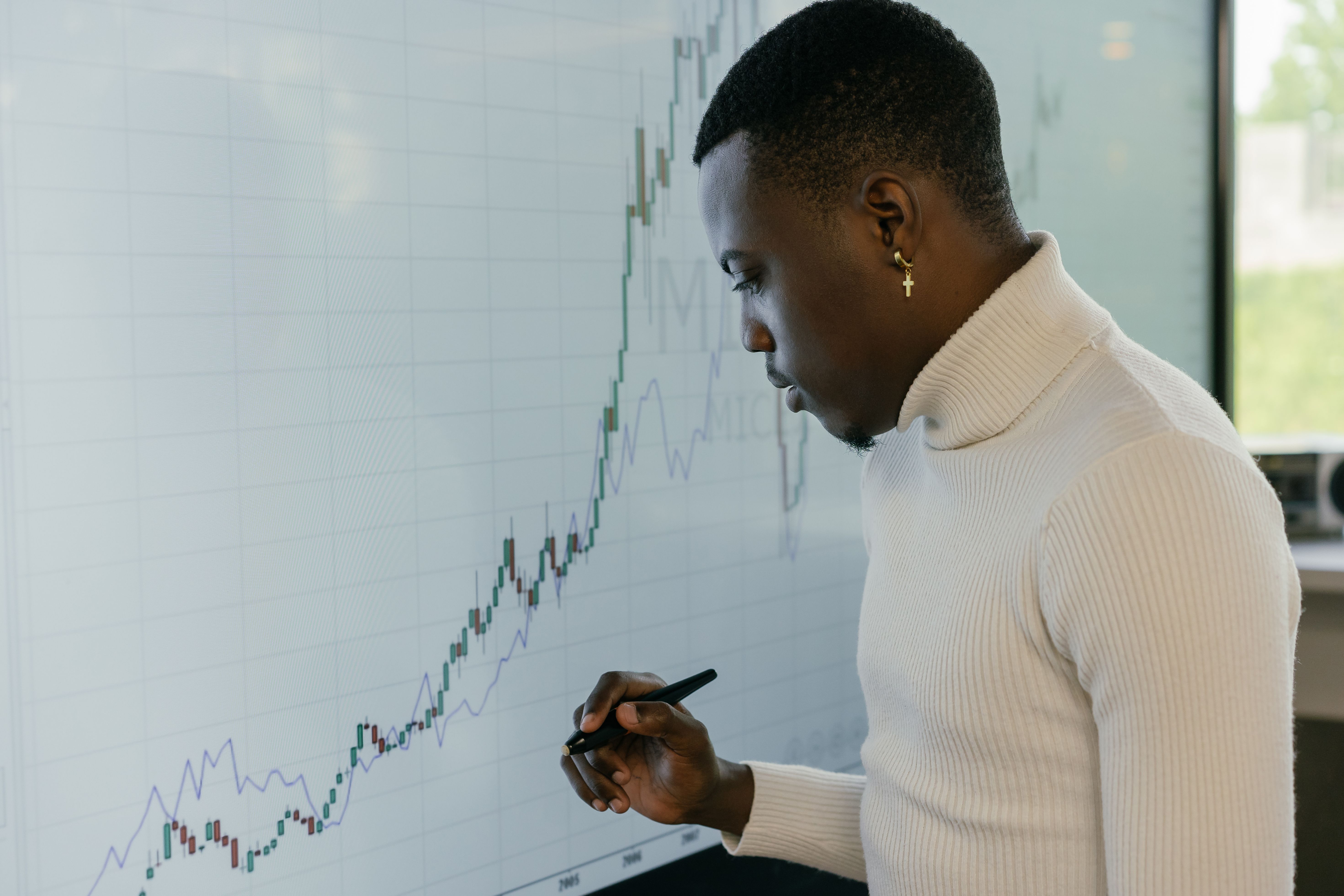 Analyst studying chart data